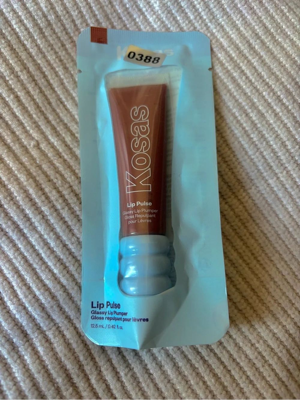 Kosas Lip Pulse Glassy Lip Plumper — Warm Brown Shade